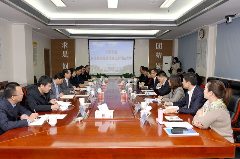罗公利会见海信集团总裁贾少谦一行